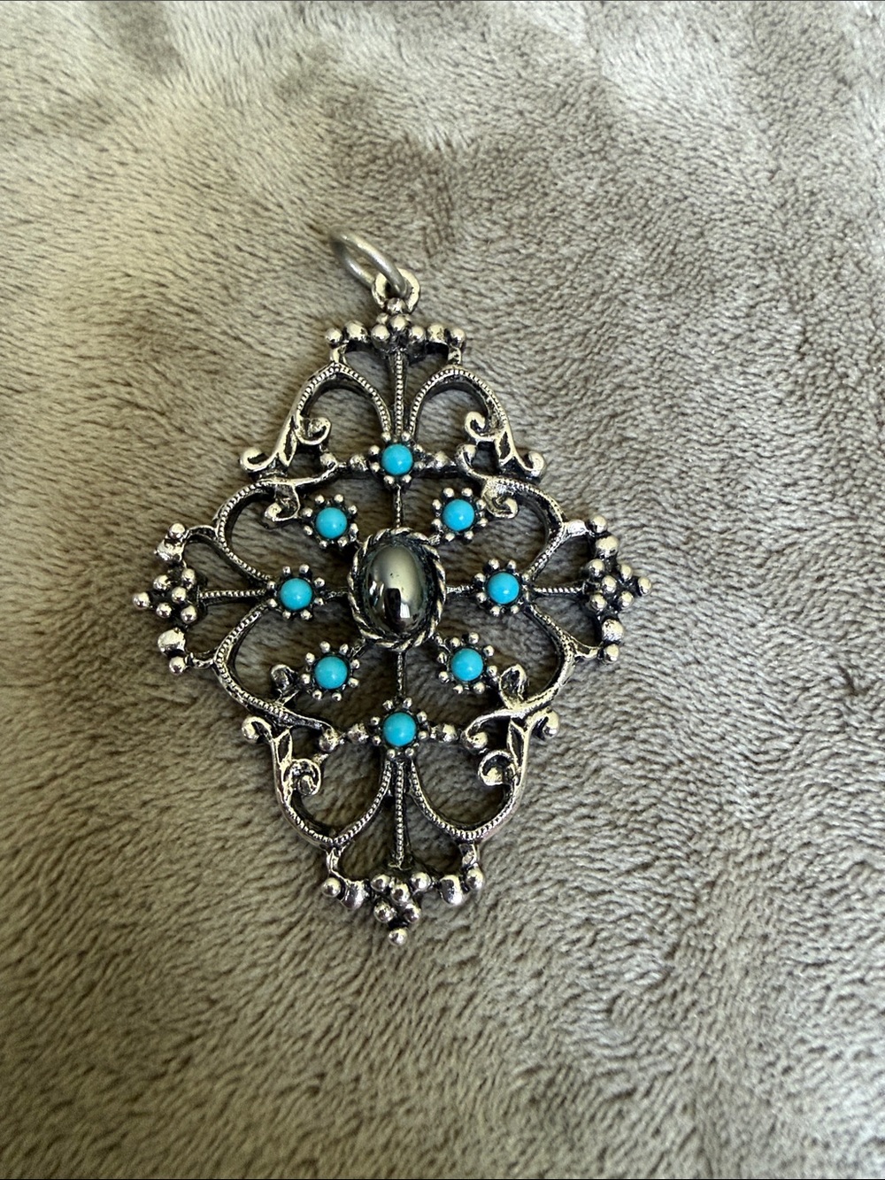 Silver tone Filigree Pendant with Turquoise colored Accents